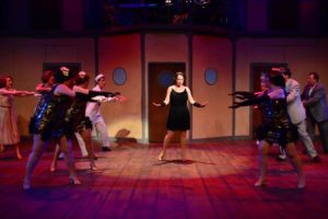 Julie Parrish (center) as Reno Sweeney in Anything Goes at Phoenix Festival Theater