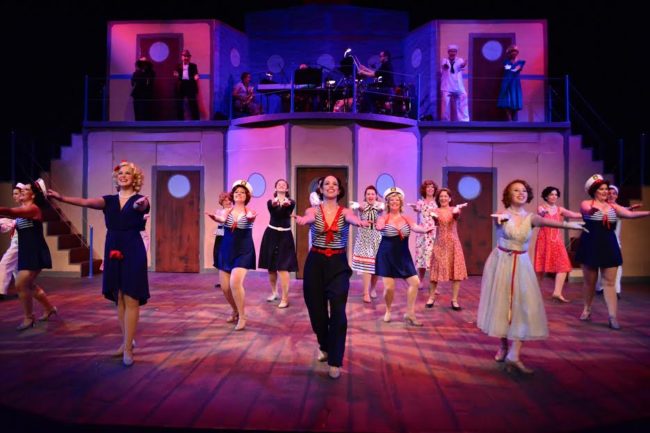 Julie Parrish (front center) as Reno Sweeney and the cast of "Anything Goes" performing the title number at Phoenix Festival Theater