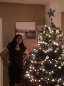 Ritija Gupta (left) and Firdinand the very American Christmas Tree (right)