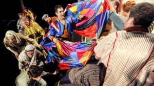 Michael Ferrante (center) as Joseph in Joseph and the Amazing Technicolor Dreamcoat