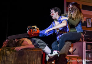 Mike Bliss (center) as Ash fighting off Candarian Demons (L- Stephanie Smith & R- Darby McLaughlin) in Evil Dead: The Musical