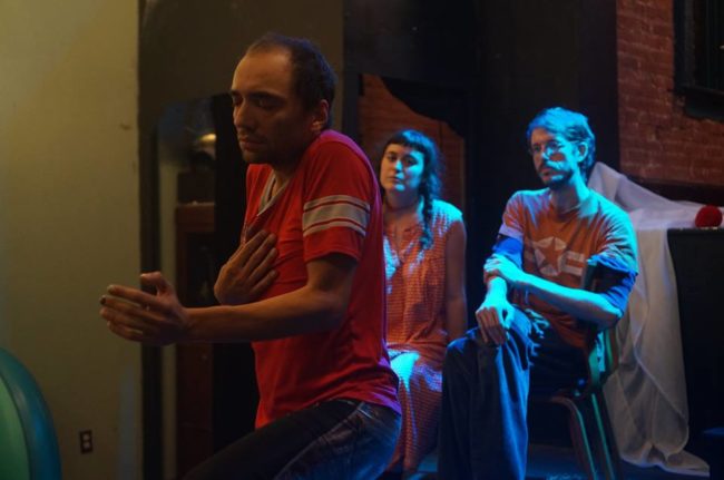 Lorenzo Baeza (left) with Allison Clendaniel (center) and Connor Kizer (right) rehearsing The Flower Queen