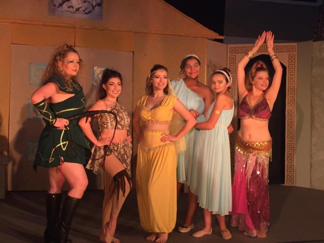 The Courtesans of the House of Marcus Lycus (from L to R) Jenny Liese as Gymnasia, Hayley Miller as Vibrata, Brittney Collins as Panacea, Aaliyah Roach & Mikayla Ann Ford as The Geminae, and Arianne Dalton as Tintinabula