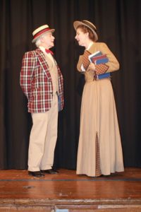 Michael Hulett (left) as Harold Hill and Ruth Hulett (right) as Marian Paroo in Music Man