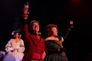 MaryKate Brouillet (left) as Emily with Jeffrey Shankle (center) as Mr. Fezziwig and Crystal Freeman (right) as Mrs. Fezziwig