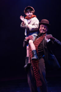 Lucas Bromberg (left) as Tiny Tim and David James (right) as Bob Cratchit