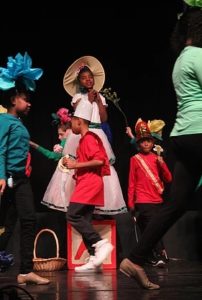 Riyan Ware (center) as Mistress Mary Quite Contrary and her Flowers