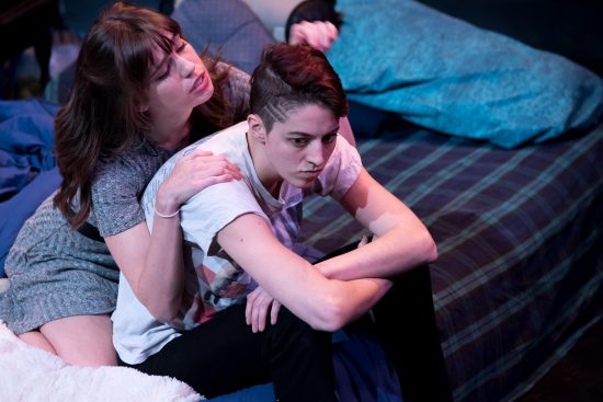 Rebecca Tucker (L.) as Rebecca and Rena Marie as O in The Zero Hour at Iron Crow Theatre.