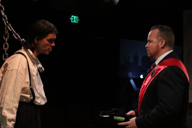 Steve Quintilian (left) as Macheath and Rob Wall (right) as Tiger Brown in The Three Penny Opera