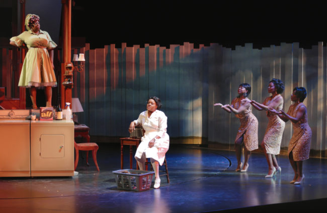 Theresa Cunningham (The Washing Machine), Nova Y. Payton (Caroline Thibodeaux), Olivia Russell, Kara-Tameika Watkins, and Felicia Curry (The Radio) in Round House Theatre’s current production of CAROLINE, OR CHANGE. 