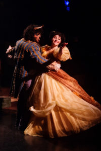 Russell Sunday (left) as The Beast and Nicki Elledge (right) as Belle
