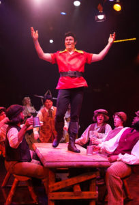David Jennings (center) as Gaston in Beauty & The Beast