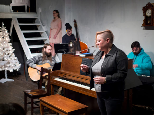 (L to R) Trevor Shipley on guitar, Amber Wood (in rotating rep) as Kathy, Cody Raum on cello, Amanda J. Rife (in rotating rep) as Jamie, and Musical Director Ben Shaver on piano