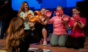 Bambi Johnson working with the cast of The Little Mermaid in rehearsal