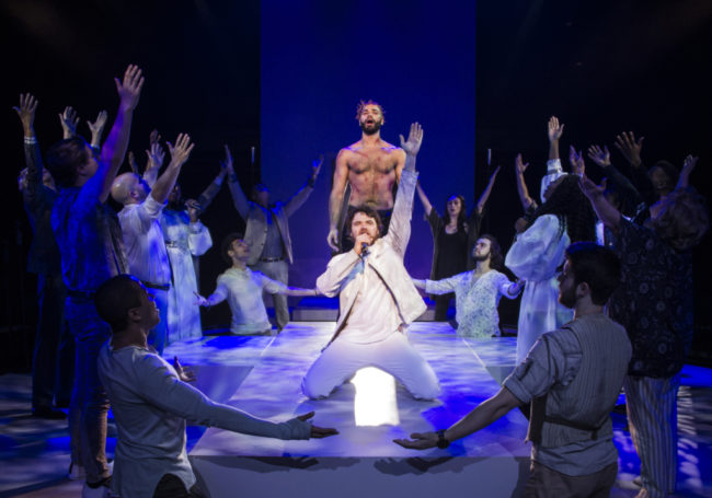 Nicholas Edwards (Jesus) and Ari McKay Wilford (Judas) with the cast of Jesus Christ Superstar at Signature Theatre