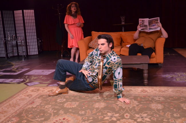 Lee Conderacci (back left) as Avril, Matthew Lindsay Payne (front center) as George and Zack Jackson (blended into the couch) as Tony in Voices in the Rubble