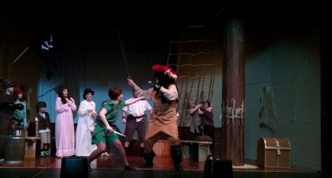 Ashley Gerhardt (center left) as Peter Pan and John Dignam (center right) as Captain Hook
