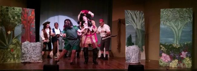 Ashley Gerhardt (center left) as Peter Pan and John Dignam (center right) as Captain Hook