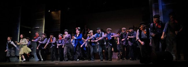 The cast of 2nd Star Productions' Mary Poppins performing "Step in Time" with Emily Mudd (center in blue) as Mary Poppins