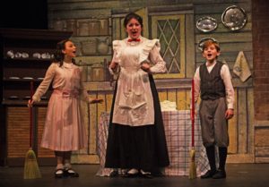 Sophia Riazi-Sekowski (left) as Jane Banks, Emily Mudd (center) as Mary Poppins, and Nathaniel Burkhead (right) as Michael Banks