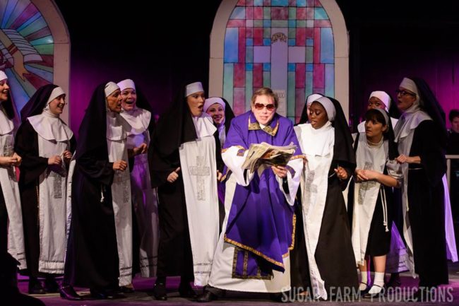 Greg Jones Ellis (center) as Monsignor O'Hara and the nuns of Sister Act