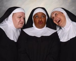 Rikki Howie Lacewell (center) as Deloris Van Cartier in guise as Sister Mary Clarence with the Sisters of Sister Act