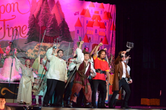 Adam Yastrzemsky (center left) as Lefou and Matthew Lamb (center right) as Gaston in "The Mob Song"