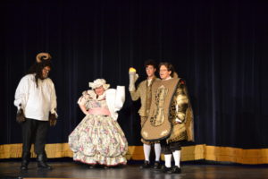 (L to R) Michael Livingston as Beast, Melissa Valdivia as Mrs. Potts, Jack Merson as Lumiere, and Ethan Brown as Cogsworth