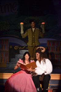 Alyson Marks (left) as Belle, Jack Merson (center) as Lumiere, and Michael Livingston (right) as Beast