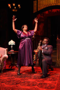 Miche Braden (left) as Bessie Smith and Anthony E. Nelson Jr. (right) on Sax 