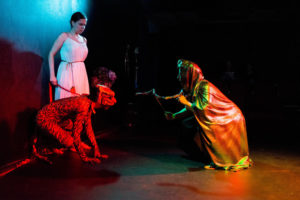 Ann Fraistat (left) as Aglaonike, Matthew Marcus (center) as Tiger, and Deborah Randall (right) as Erichtho