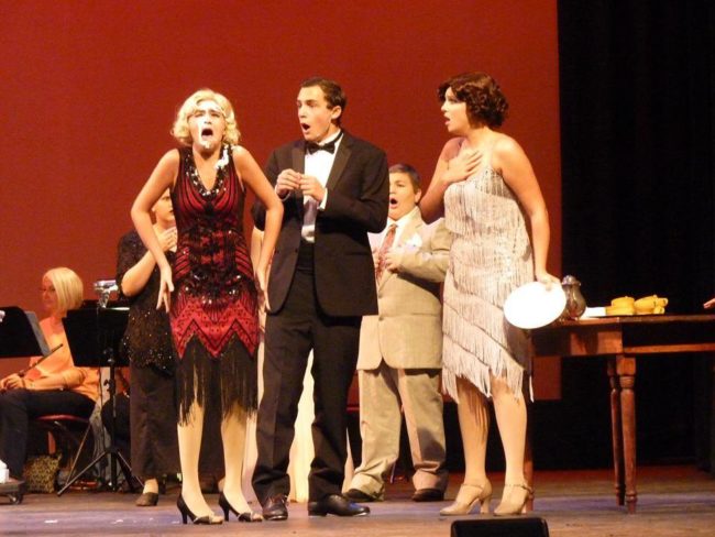 Olivia Aubele (left) as Lina Lamont, Kevin Franiak (center) as Don Lockwood and Rachel Miller (right) as Kathy Selden in Singin' in the Rain Jr. 