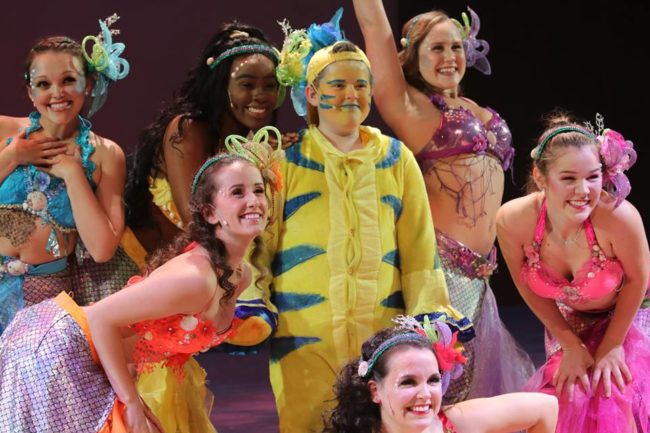 Daniel Koncurat (center) as Flounder and The Mersisters of The Little Mermaid