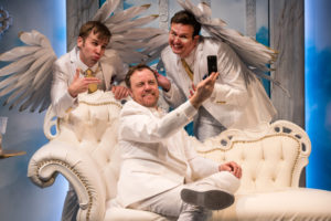 Tom Story (God), Jamie Smithson (Gabriel) and Evan Casey (Michael) in An Act of God at Signature Theatre.