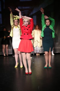 Ellie Parks (left) as Heather McNamara, Bryce Gudelsky (center) as Heather Chandler, and Emily Wesselhoff (right) as Heather Duke