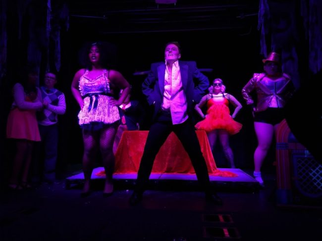 L to R Siren as Janet Weiss, Alex Bengel as Brad Majors, Duchess LeNoire as Magenta, Jonathan Lightner as Riff Raff, Schmutzie B as Phantom, and Tapitha Kix as Columbia