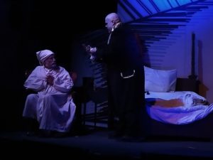 Richard Peck (left) as Ebenezer Scrooge and Thom Platt (right) as The Ghost of Jacob Marley