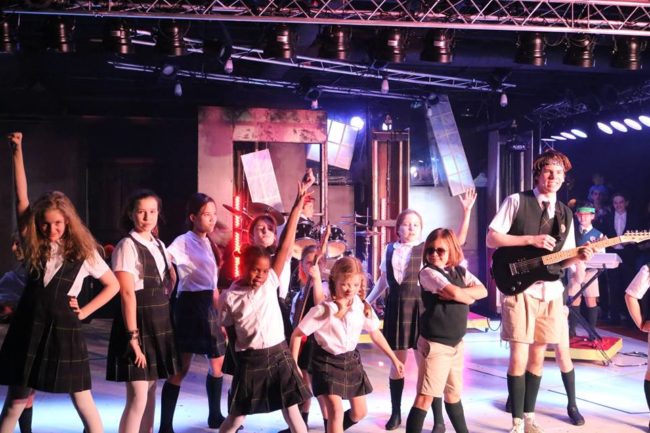 The Students of School of Rock at The Students' Theatre at The Highwood Theatre