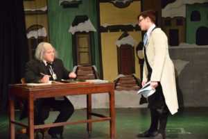 Matthew Trulli (left) as Scrooge and Ethan Holler (right) as Fred