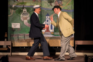 Joe Weinhoffer (left) as Harold Hill and Andrew Pedrick (right) as Marcellus Washburn in The Music Man