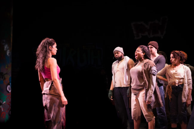 Briana Taylor (left) as Brooklyn and Taylor J. Washington (right) as Paradice with the ensemble of Brooklyn the musical