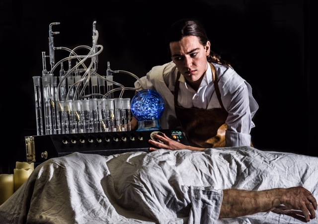 Victor Frankenstein (Michael Bannigan) creating the creation (Tennyson Harris).