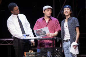 J. Quinton Johnson (left) as Benny, Anthony Ramos (center) as Usnavi, and Mateo Ferro (right) as Sonny