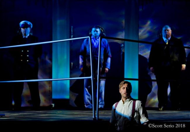 Rob Tucker (center) as Mr. Andrews in Titanic at Scottfield Theatre Company