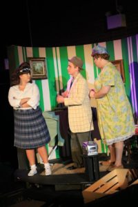 Valerie Ziegler (left) as Tracy Turnblad, Dylan Morrison (center) as Wilbur Turnblad, and Matthew Byrd (right) as Edna Turnblad