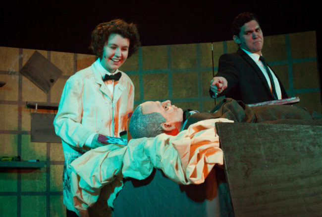 June Keating (left) as Silas Cryptz and Eric Poch (right) as Reggie Cryptz 