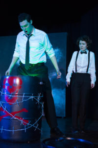 Eric Poch (left) as Reggie Cryptz and June Keating (right) as Silas Cryptz 