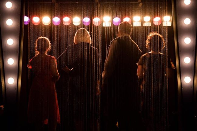 (L to R) Kirsti Dixon, Caitlyn Ruth McClellan, John Purnell, and Traci Denhardt "on stage" from "back stage" in Bullets Over Broadway at Annapolis Summer Garden Theatre