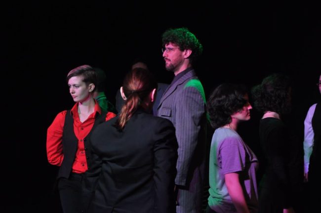 Joshua Engel (center) as Shylock in The Merchant of Venice