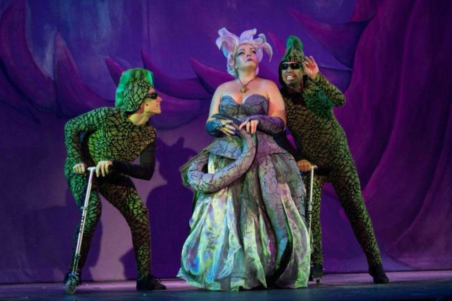 Josh Schoff (left) as Flotsam, Holly Gibbs (center) as Ursula, and Jonah Wolf (right) as Jetsam in The Little Mermaid